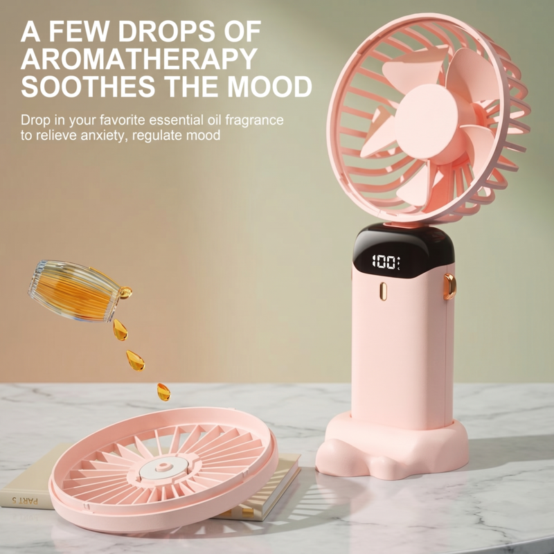 Close-up of the Alphinea fan's aromatherapy feature with essential oil drops for a soothing breeze.