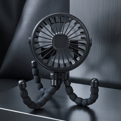 A sleek black Alphinea octopus-style fan with a built-in light, standing in a modern indoor setting with its flexible tripod legs extended.