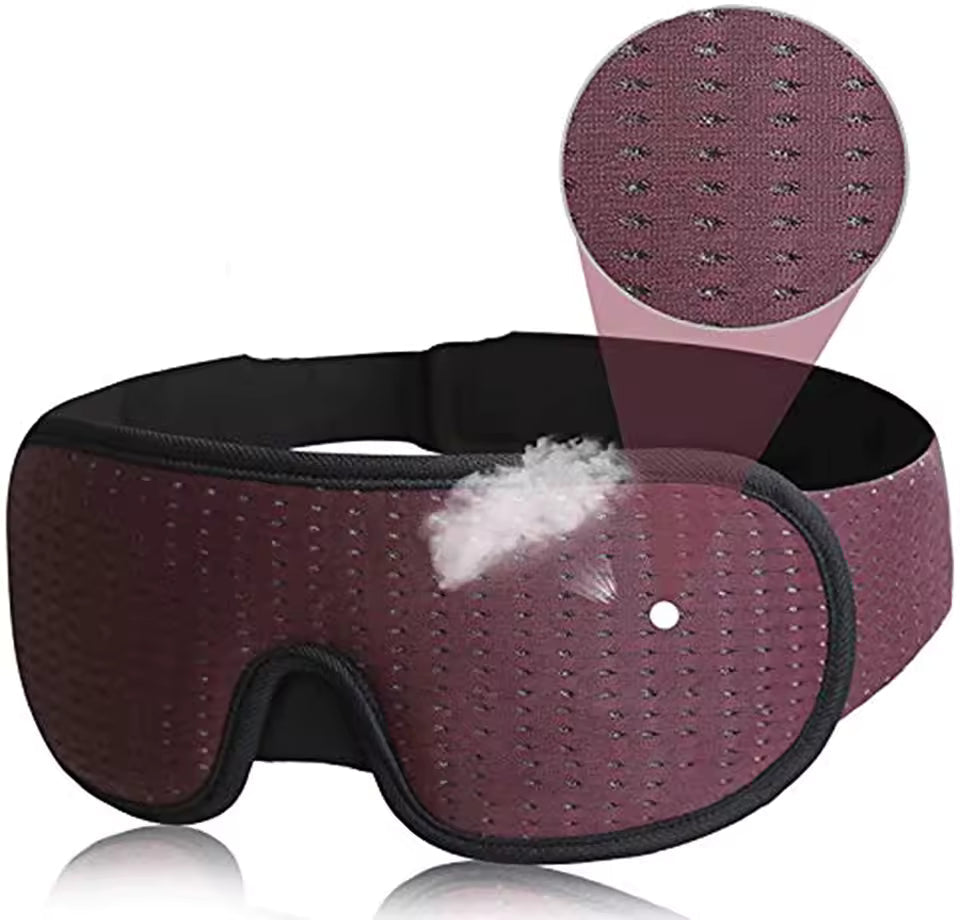Alphinea 3D sleep mask in burgundy, showcasing a close-up of the featherweight, skin-friendly breathable mesh fabric.