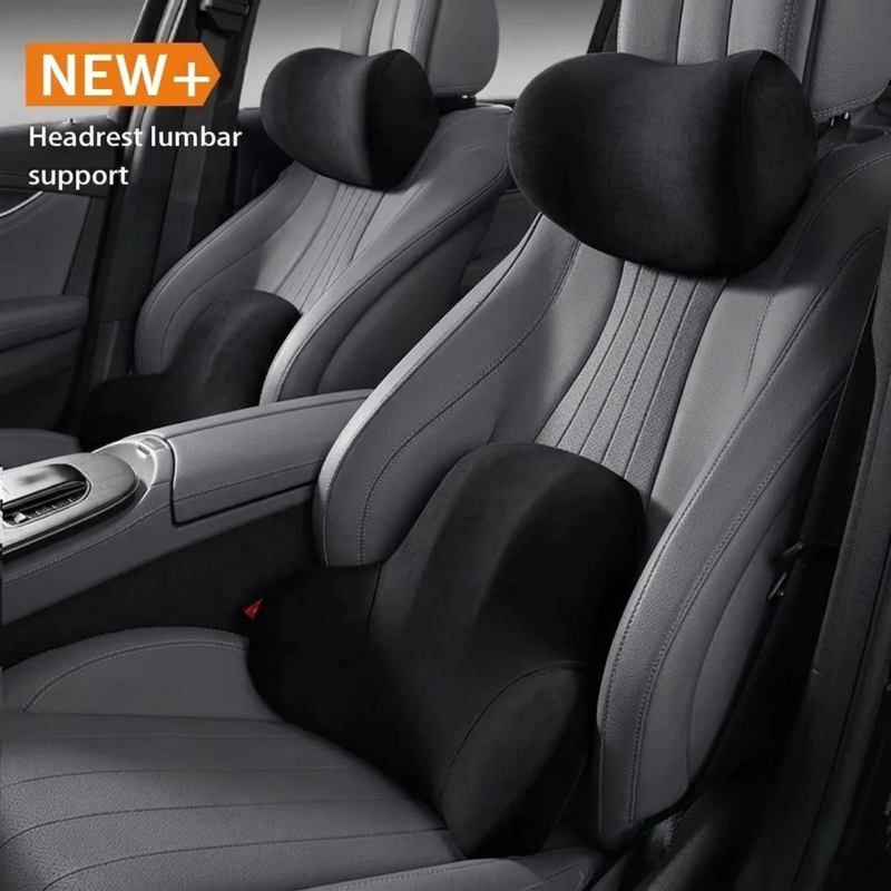 The black Alphinea Dual-Zone Automotive Comfort Suite, including both the neck rest and lumbar cushion, installed in a modern car interior to provide full-coverage back support.