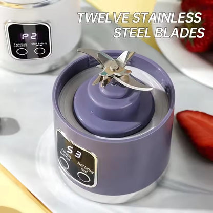 Top-down view of the Alphinea blender's motor base featuring the heavy-duty, twelve-blade stainless steel extraction system.