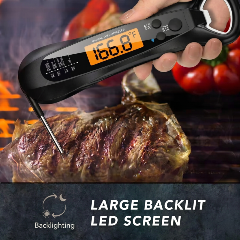 Alphinea digital meat thermometer inserted into a grilled steak, featuring a large, high-contrast backlit LED screen for ultra-fast 2-3 second temperature readings.