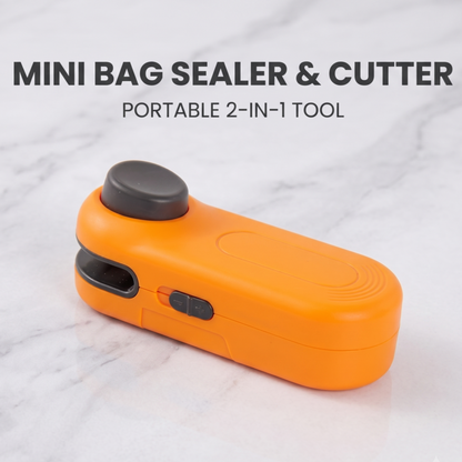 Gros plan en biais de l'outil portable 2 en 1 Alphinea, mini scelleuse et coupe-sacs orange vif, élégamment posé sur un comptoir en marbre blanc.