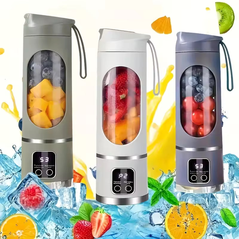 Three Alphinea portable cordless blenders in grey, white, and navy blue, filled with fresh fruit and surrounded by splashing water and ice cubes.