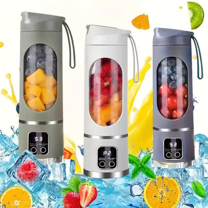 Three Alphinea portable cordless blenders in grey, white, and navy blue, filled with fresh fruit and surrounded by splashing water and ice cubes.