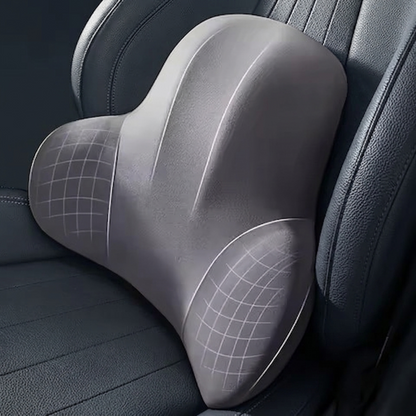Detailed view of the gray Alphinea contoured lumbar cushion on a dark car seat, highlighting the breathable advanced airflow textile and ergonomic S-curve design that prevents slouching.