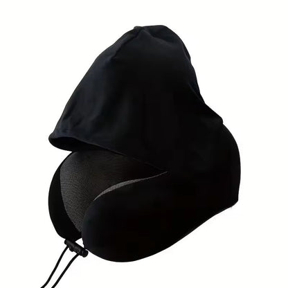 A side-angle view of the black Alphinea hooded travel pillow, illustrating the deep, reinforced U-shaped architecture designed to prevent head-bob and provide neck pain relief.